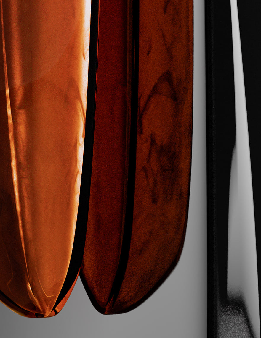 Gros plan sur de grandes formes courbes laquees, orange ambre et noir brillant, detail d'un decor de boutique.